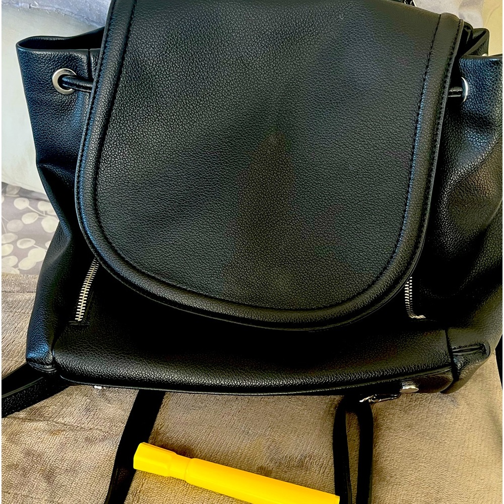 INC backpack black 2 front side zipper pockets and one back zipper pocket